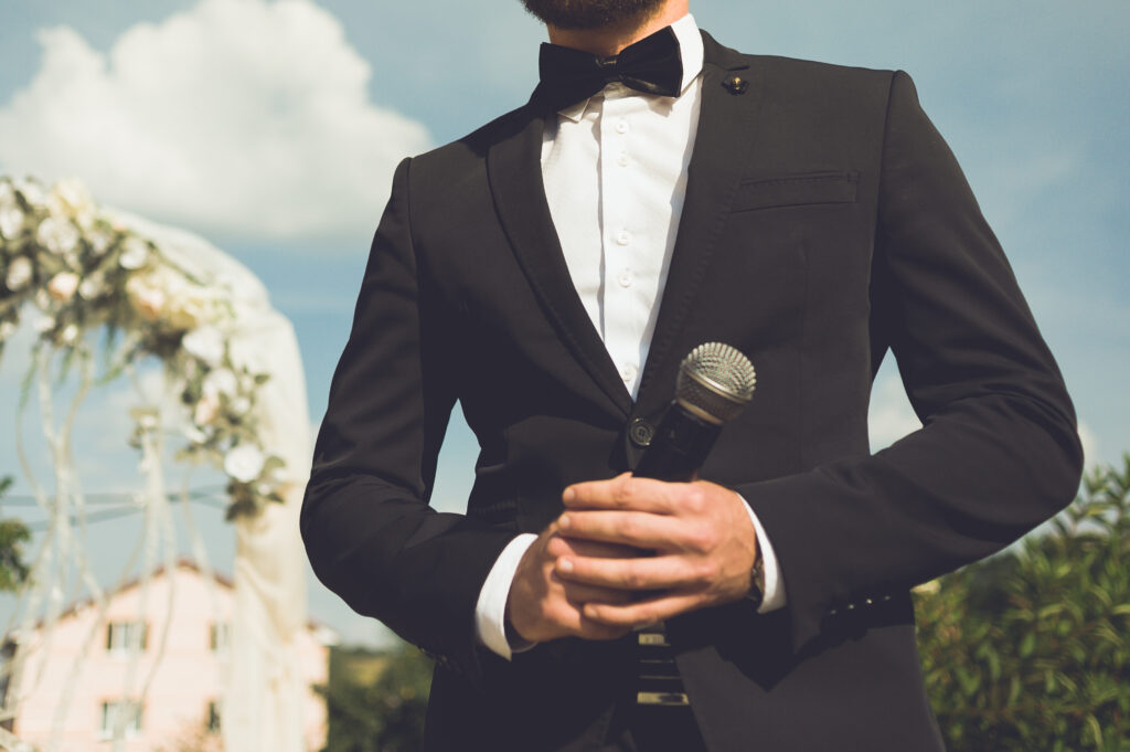 toastmaster at a wedding. mc.